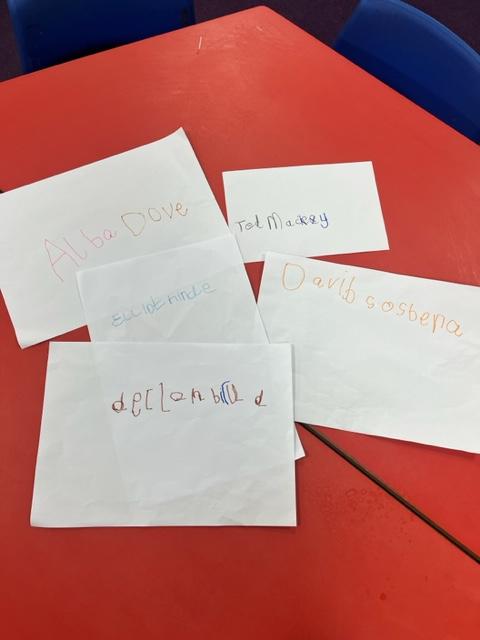 Children have been practising saying and writing their full names.